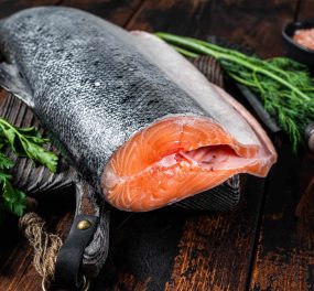 big-piece-of-raw-cut-salmon-fish-on-a-wooden-cutti-2021-12-09-03-21-07-utc.jpg